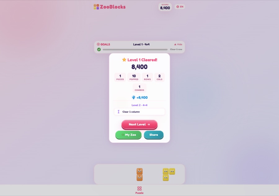 ZooBlocks level complete card showing 8,400 points, diamonds awarded, and turn statistics